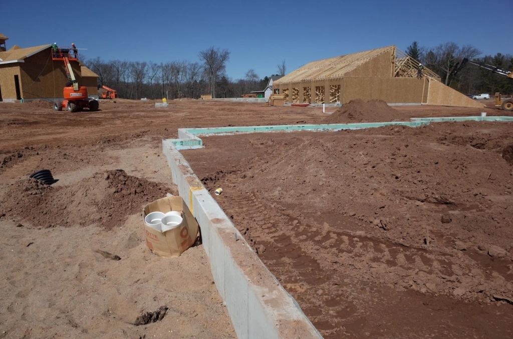 Prepared building pads ready for foundation construction in a new development area