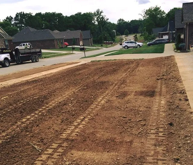 Nicely graded plot of land, demonstrating precise land leveling for construction